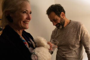 A man and woman holding a stuffed animal. A man and woman holding a stuffed animal.
