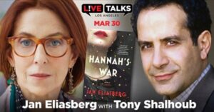 A woman and man with glasses next to a book.