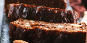 A close up of two slices of cake on a plate